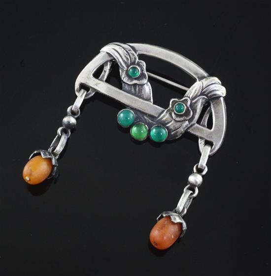 An early 20th century Georg Jensen 828S, green chalcedony and amber demi-lune drop brooch, no. 8, 1909-1914 mark, 49mm.